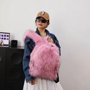Detailed view of pink faux fur backpack with fluffy raccoon hair texture in Y2K style.