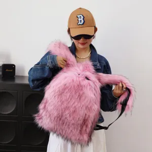 Y2K fashion large pink faux raccoon fur backpack shown on an Asian model in detail view