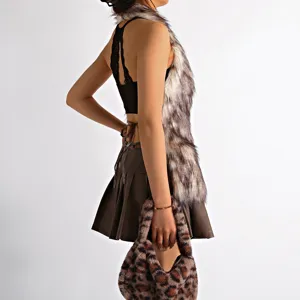 Side view of a shaggy Mongolian faux fur vest with a sexy backless lace halter top