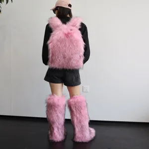 Full rear view of a model wearing a fluffy pink faux fur Y2K backpack with leg warmers