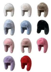 Detailed display of multiple color options for plush faux fox fur trapper hats for winter.