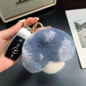 Cute mushroom plush keychain made of soft blue rex rabbit fur with golden ring