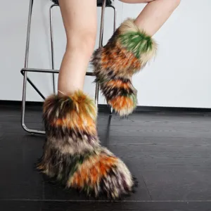 Macro view of vibrant colorful faux raccoon fur snow boots in a fluffy Y2K aesthetic style