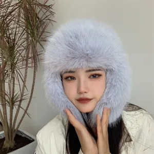 Close-up of a plush faux fox fur ushanka hat with ear flaps for winter fashion and warmth.
