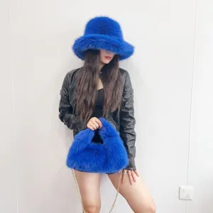 Stylish electric blue faux fox fur bucket hat and matching hobo bag set for women