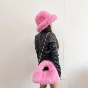 Fashionable pink faux fox fur bucket hat and matching chain strap hobo bag set for women