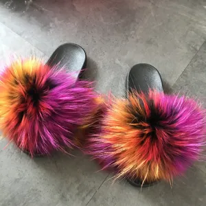 Ciabatte in vera pelliccia di procione e volpe con suola in PVC nero antiscivolo