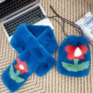 Blue faux fur scarf and drawstring bag set with vibrant red flower motif design