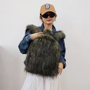 Trendy Y2K style green faux raccoon fur large backpack worn by model in denim jacket