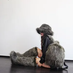 Stylish Y2K fashion faux raccoon fur backpack with matching hat and leg warmers set