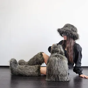 Detail view of large faux raccoon fur backpack in Y2K fashion style with matching hat