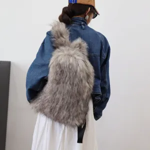 Back view of a fluffy grey faux raccoon fur backpack on a model in Y2K fashion style