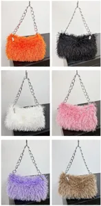 Detailed view of shaggy faux fur baguette bags with silver chain straps in six colors