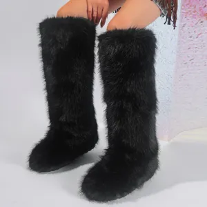 Detailed view of stylish black faux fur knee-high snow boots for women in Y2K style