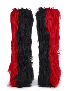 Close-up of red and black furry knee-high boots with shaggy faux fur texture.