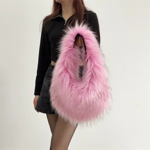 Close-up of a vibrant pink long-haired faux fur handbag in a trendy Y2K aesthetic style