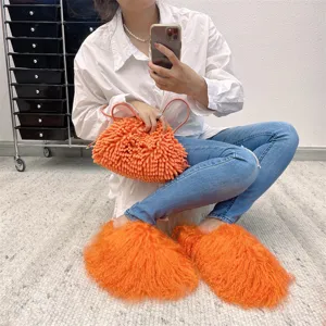 Cozy bright orange Mongolian fur slides with matching shaggy handbag winter set