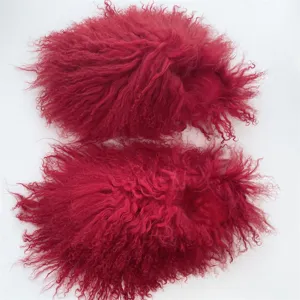 Luxury red Mongolian sheep fur slides featuring a thick fluffy curly texture for winter warmth