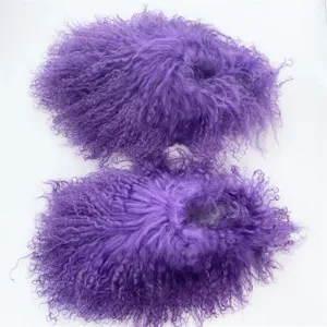 Detailed close-up of curly purple Mongolian lamb fur texture on warm winter luxury slides
