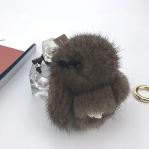 Detailed view of an 8cm brown mink fur rabbit keychain showing soft, fluffy texture