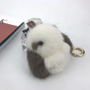 Detail of 8cm mink fur rabbit keychain with soft white and brown plush texture