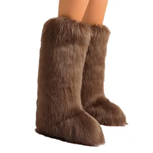 Bottes de neige hauteur genou en fausse fourrure de renard marron avec texture moelleuse