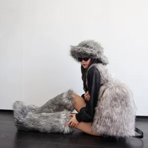 Close-up of fluffy gray faux raccoon fur backpack with matching hat and leg warmers