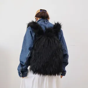 Stylish black faux fur backpack with fluffy rabbit ears in a trendy Y2K fashion lifestyle shot