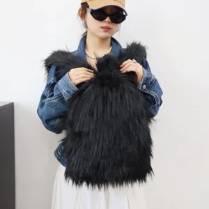 Detail view of the Y2K style black faux raccoon fur backpack with long shaggy texture