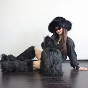 Detail of black faux raccoon fur backpack in Y2K style worn by model in studio