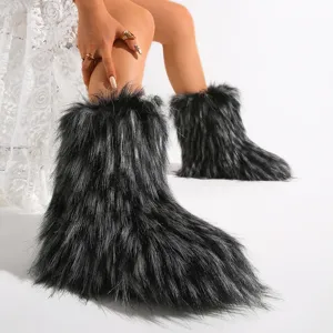 Vista detallada de las botas de nieve de piel sintética negra para mujer estilo Y2K