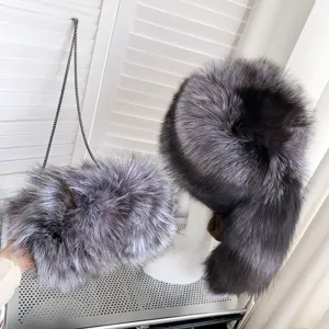 High-quality detailed view of silver fox fur hat and matching plush chain handbag for winter