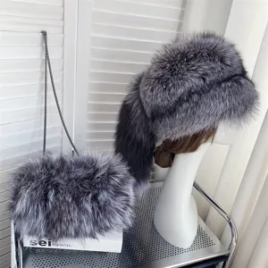 Detailed view of luxury silver fox fur hat with tail and matching plush crossbody chain bag