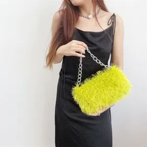 Vibrant lime green faux fur baguette bag with a chunky silver metal chain handle