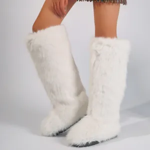 Detailed view showing the fluffy white faux fox fur texture on these Y2K winter snow boots