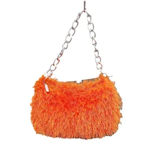 Vibrant orange faux fur baguette handbag featuring a chunky silver chain shoulder strap