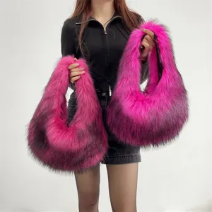 Detailed view of vibrant hot pink and black faux fur hobo handbag with a plush Y2K aesthetic