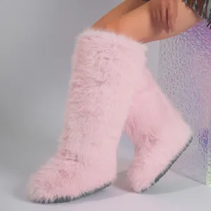 Pink faux fox fur knee-high snow boots with Y2K style and warm lining