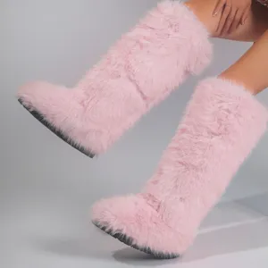 Cozy light pink Y2K style faux fox fur knee-high snow boots for women winter fashion attire