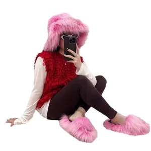 Stylish faux raccoon fur hat and slipper set in vibrant pink for a punk fashion look