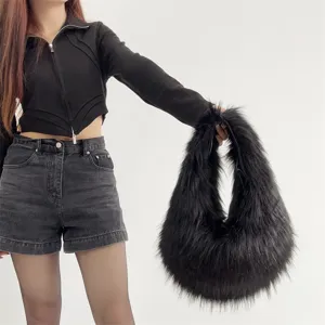 Macro view of a black fluffy faux fur tote bag styled for Y2K fashion aesthetics