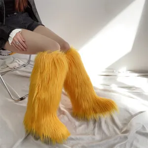 Close-up of vibrant yellow long faux fur texture on knee-high boots with plush lining