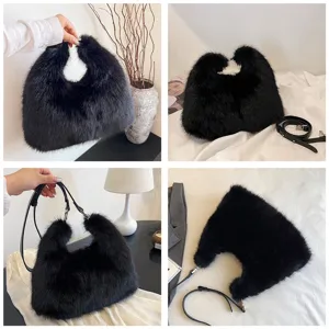 Macro view of black faux fur handbag with detachable shoulder strap and plush texture.