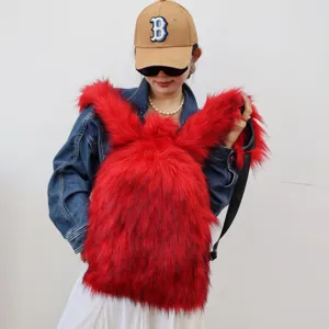 Detailed view of a vibrant red faux fur backpack in a trendy Y2K style
