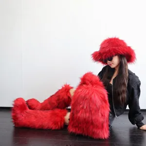 Stylish Y2K red faux raccoon fur backpack shown with matching plush hat and leg warmers