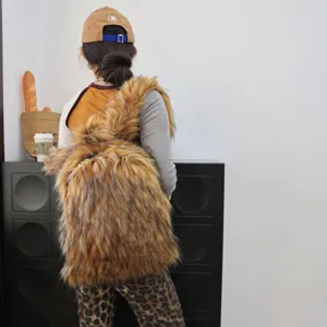 Large capacity Y2K style faux raccoon fur backpack featuring a soft and fluffy texture