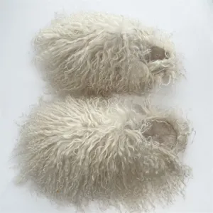 Plush Mongolian fur slides in cream white, featuring long curly wool for warmth.