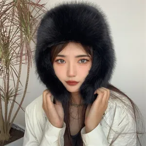 Elegant black faux fox fur trapper hat with soft plush earflaps for winter outdoor skiing