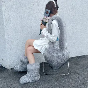 Stylish Y2K style faux fur set with heart-shaped shoulder bag and fuzzy snow boots in grey