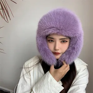 Close-up of a purple faux fox fur aviator hat with ear flaps for winter warmth